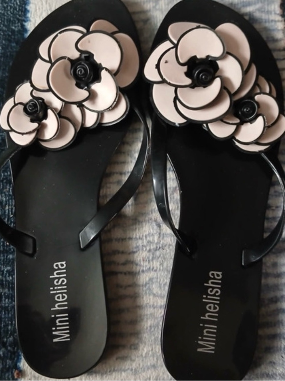 Women's Black Flip Flops with Pink Flower Accent